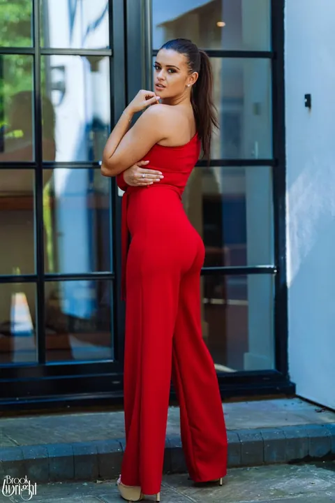 Brook Wright: British Brunette Reveals Her Big Tits After Red Pantsuit – photo 1 of 12
