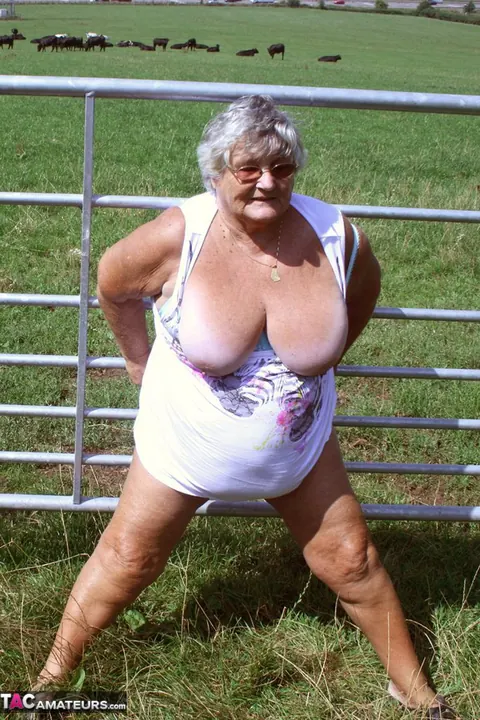 Thick British Brunette Bares Her Big Tits in the Forest – photo 13 of 20