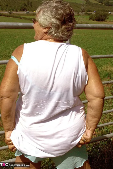 Thick British Brunette Bares Her Big Tits in the Forest – photo 20 of 20