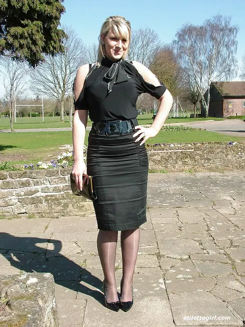 Demi Scott: Blonde PAWG Poses in a Skirt and High Heels Outdoors – photo 1 of 16