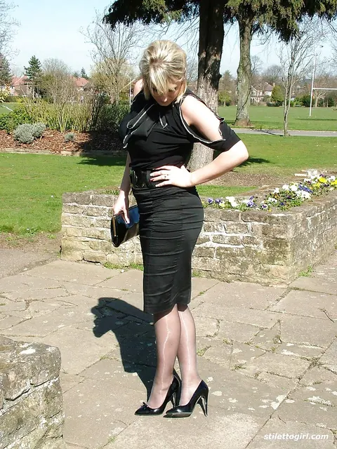 Demi Scott: Blonde PAWG Poses in a Skirt and High Heels Outdoors – photo 3 of 16