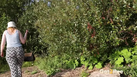 European BBW Spreads and Pisses Outdoors Near Bushes – photo 15 of 15