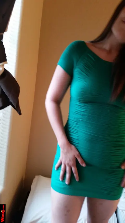 Redhead Poses in a Skirt and Teases Over Her Shoulder – photo 14 of 15
