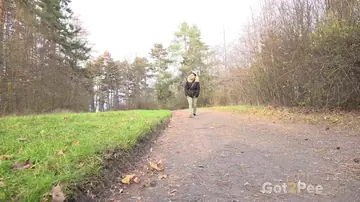 European Woman Pisses on a Rural Road with Hairy Pussy