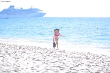 Tall Blonde MILF Poses in a Pink Bikini and Glasses on the Beach