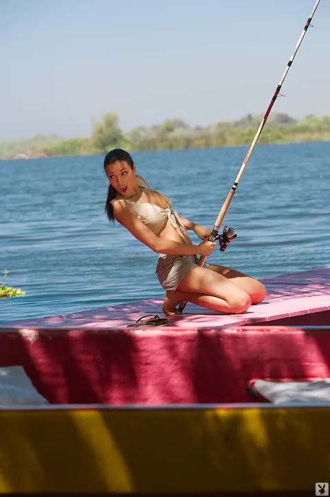 Jo Garcia: Busty Latina MILF Sunbathes Topless by a Tree – photo 2 of 17
