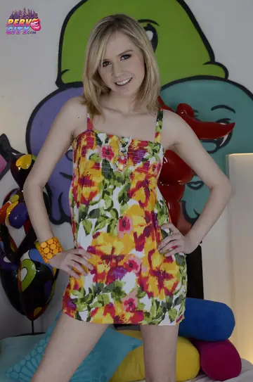 Slim Blonde Lifts Her Skirt and Spreads Her Shaved Pussy Standing