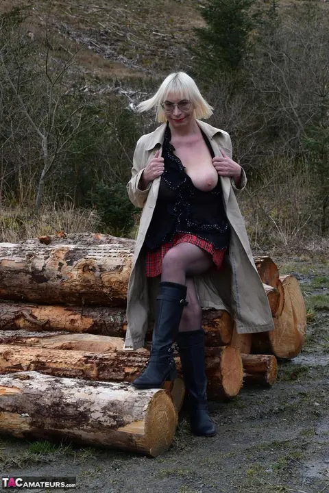 British Blonde Peels Off Her Skirt for Pantyhose and Boots Outdoors – photo 2 of 16
