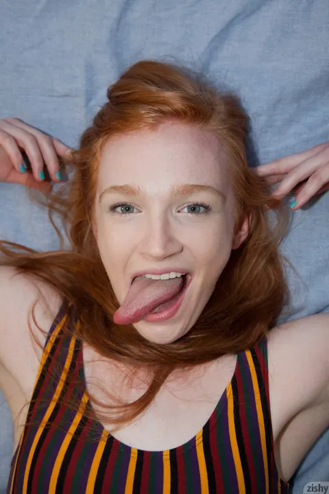 Bree Abernathy: Redhead Teases in Her Clothes While Eating a Banana – photo 8 of 11