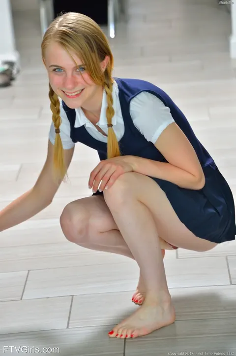 Charlotte Carmen: Skinny Blonde in Uniform Skirt Spreads Outdoors – photo 11 of 16