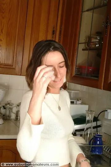 European Brunette Strips and Fingers Her Pussy in the Kitchen