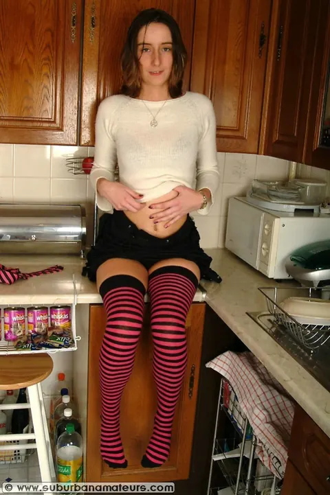 European Brunette Strips and Fingers Her Pussy in the Kitchen – photo 4 of 21