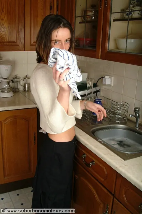 European Brunette Strips and Fingers Her Pussy in the Kitchen – photo 2 of 21