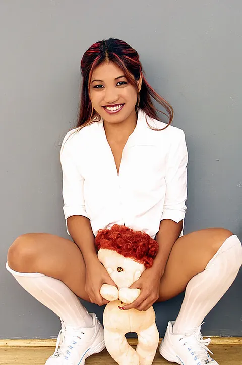 Lyla Lei: Thai Brunette Spreads Her Pussy in a Skirt and Socks – photo 7 of 12