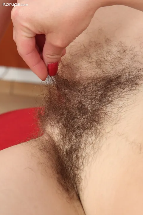 Hairy MILF Pulls Panties Aside and Spreads Her Pussy – photo 16 of 21