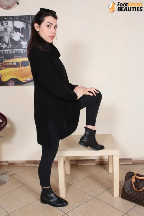 European Brunette in Glasses Removes Her Boots and Socks – photo 3 of 12