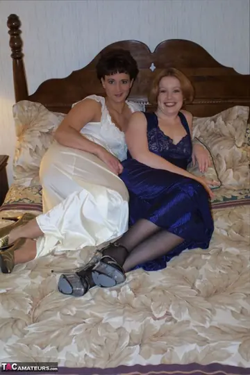 Curvy Redhead MILFs Have Lesbian Sex in Stockings and Skirts