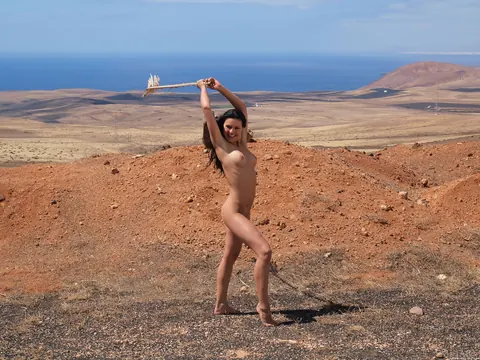 Woman Strips Nude and Models Her Body Front and Back – photo 9 of 21