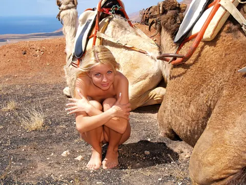Woman Strips Nude and Models Her Body Front and Back – photo 7 of 21