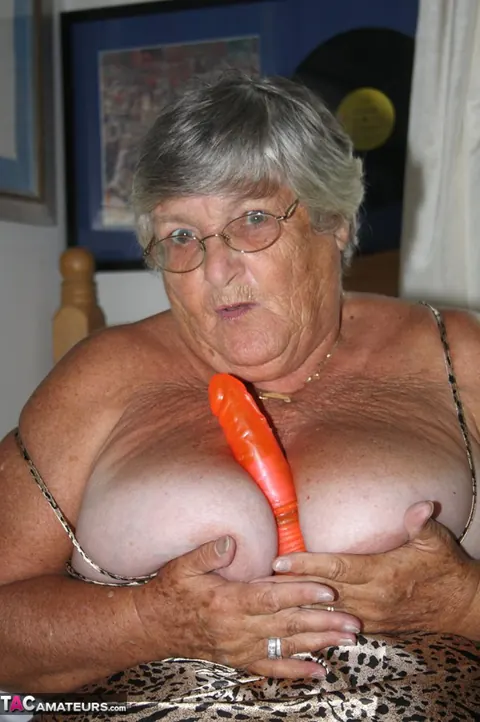 British Silver-Haired BBW Masturbates with a Dildo on the Bed – photo 12 of 20
