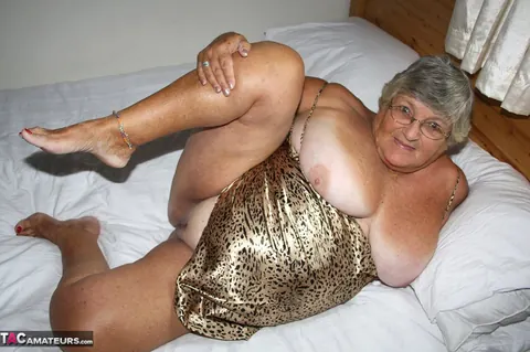 British Silver-Haired BBW Masturbates with a Dildo on the Bed – photo 7 of 20