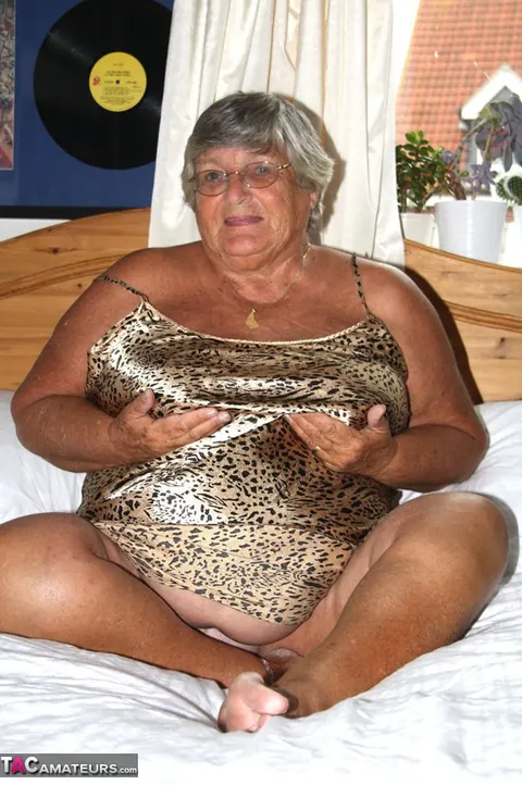 British Silver-Haired BBW Masturbates with a Dildo on the Bed – photo 2 of 20