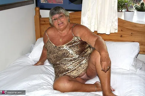 British Silver-Haired BBW Masturbates with a Dildo on the Bed – photo 1 of 20