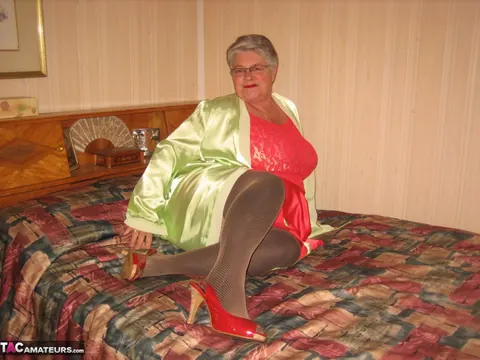BBW in Stockings and Heels Strips and Fingers on the Bed – photo 2 of 20