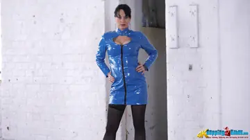 Woman Removes Her Latex Dress and Poses Nude in Stockings