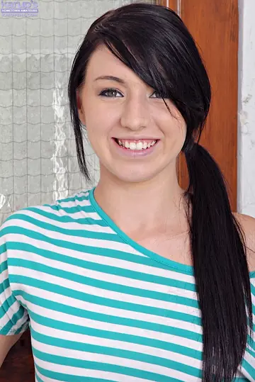 Brunette with Tattoo and Piercing Spreads Her Pussy