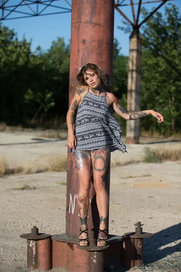 Short-Haired Woman Strips Out of Her Dress and Spreads