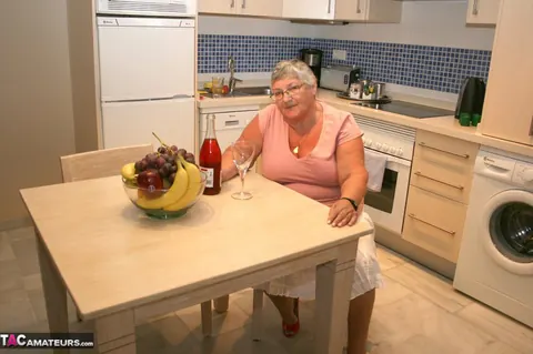 Busty European MILF Strips and Toys Her Pussy in the Kitchen – photo 1 of 20