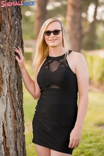 Blonde Trans Woman Strips Nude and Flaunts Her Big Tits
