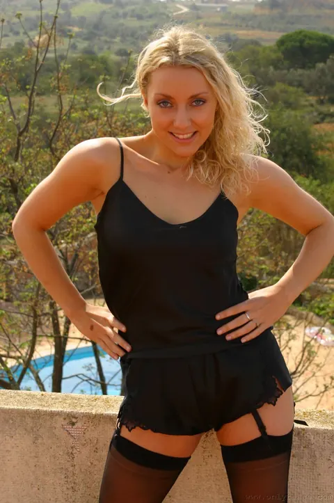 European Woman Poses and Spreads Her Legs Clothed – photo 2 of 21