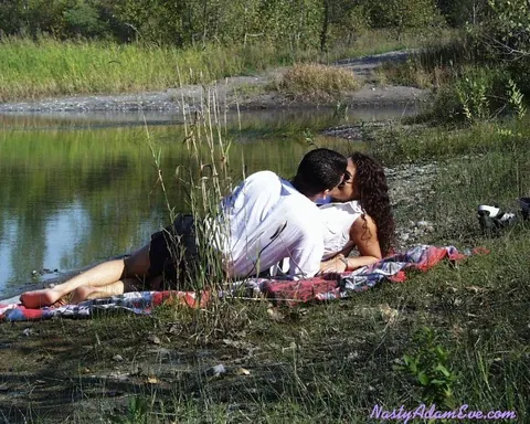 Woman in Shorts and Glasses Takes Two Men Outdoors – photo 3 of 15