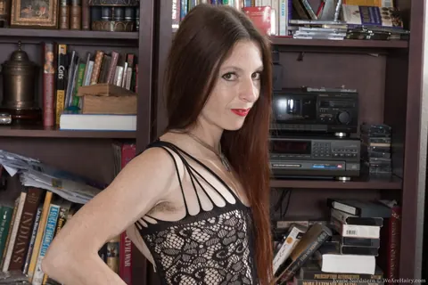 Evane Nordstern: Hairy Redhead Pulls Aside Bodystocking to Show Her Tits and Spread Her Pussy – photo 6 of 17