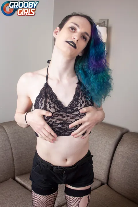 Trans Woman in Fishnet Stockings Strokes Her Cock – photo 5 of 16
