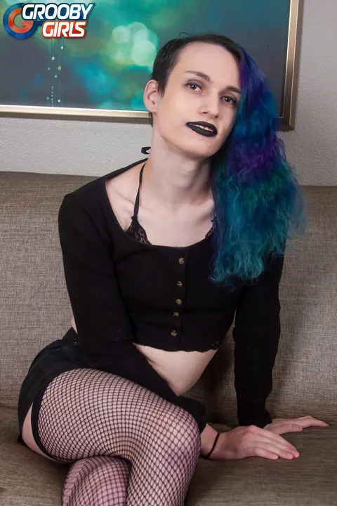 Trans Woman in Fishnet Stockings Strokes Her Cock – photo 1 of 16