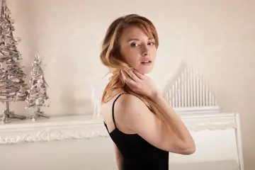 European Redhead in a Black Dress Spreads Her Shaved Pussy