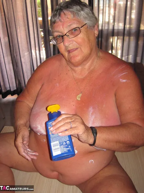 Busty Brunette in Glasses Oils Her Tits and Spreads – photo 12 of 20