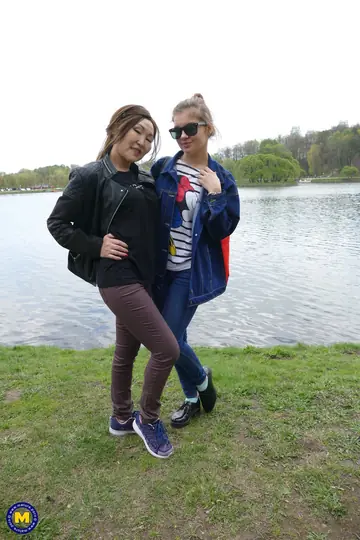 Lira Kissy – Asian and European MILFs Kiss by the River in Glasses