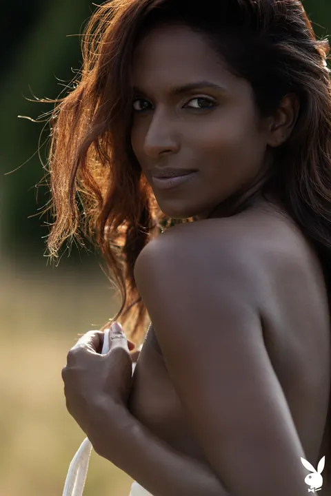 Nirmala Fernandes: Woman with Small Tits Strips Out of Her Bodysuit Outdoors – photo 4 of 20