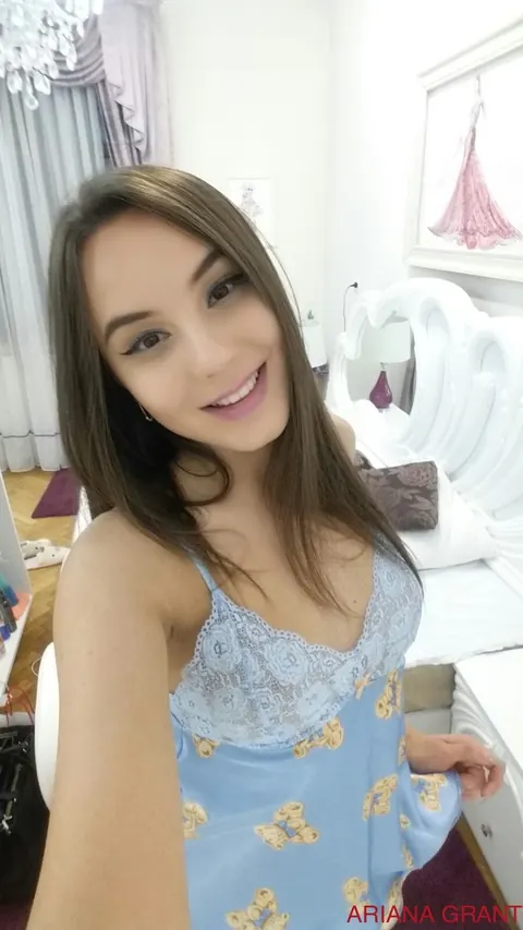 Brunette Strips Nude and Turns for the Camera – photo 14 of 14