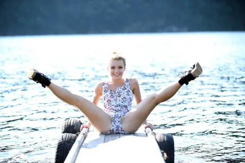 Skinny Blonde Strips Out of Her Panties on a Dock – photo 2 of 21