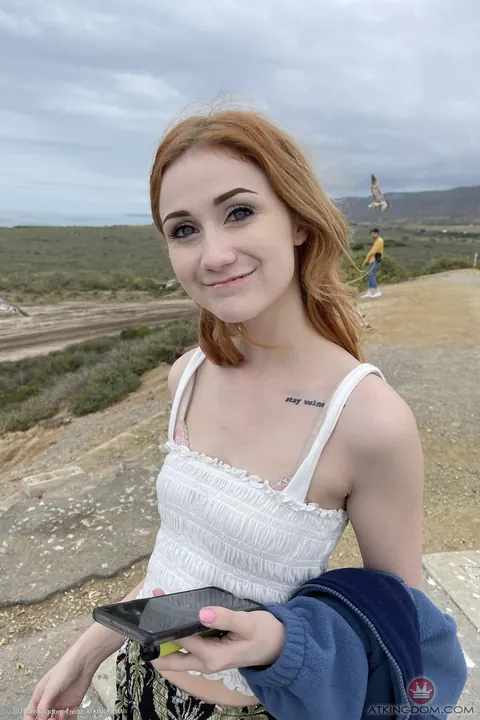Scarlet Skies: Redhead with Tattoo Spreads Her Pussy in Close-Up – photo 1 of 20