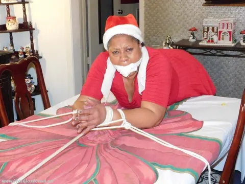Mature Ebony Woman Tied Over a Table at Christmas in Panties – photo 3 of 16