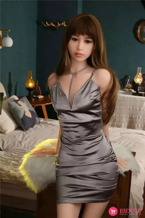 Asian Woman Strips Out of Her Silver Dress – photo 5 of 16