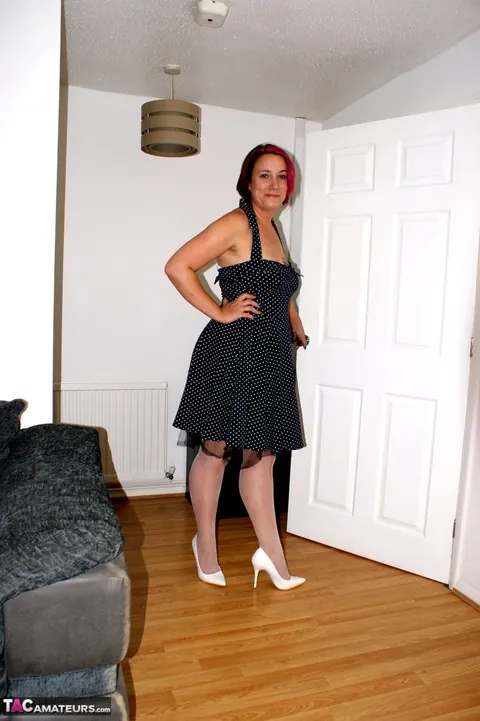 Sarah Banks: Curvy Redhead MILF Shows Off in Lingerie and Stockings – photo 3 of 16