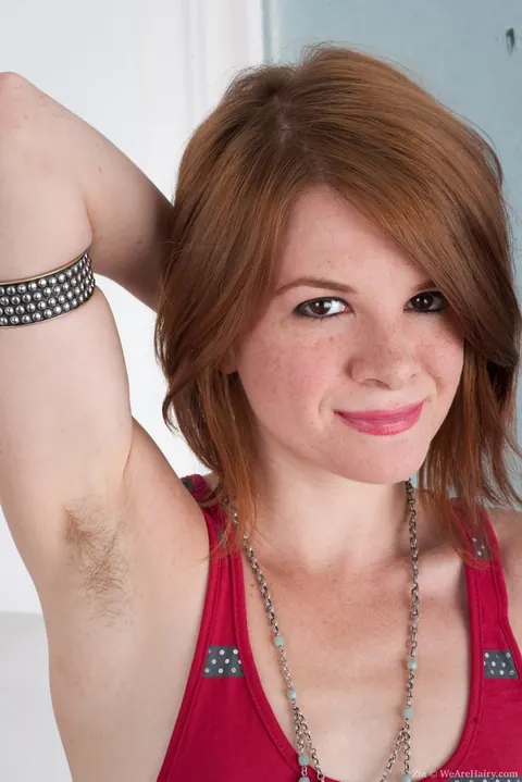 Thick Redhead MILF Strips Out of Her Shorts to Show Her Hairy Bush – photo 1 of 16