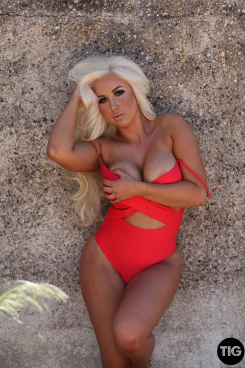 Lucy James: Blonde with Big Tits Strips Out of Her Bikini and Bodysuit Outdoors – photo 4 of 21